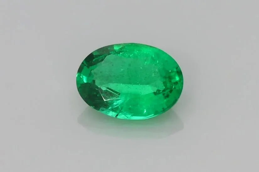 0.66ct Oval Natural Emerald (Colour Green, Clarity Slightly Included, Cut Faceted)
