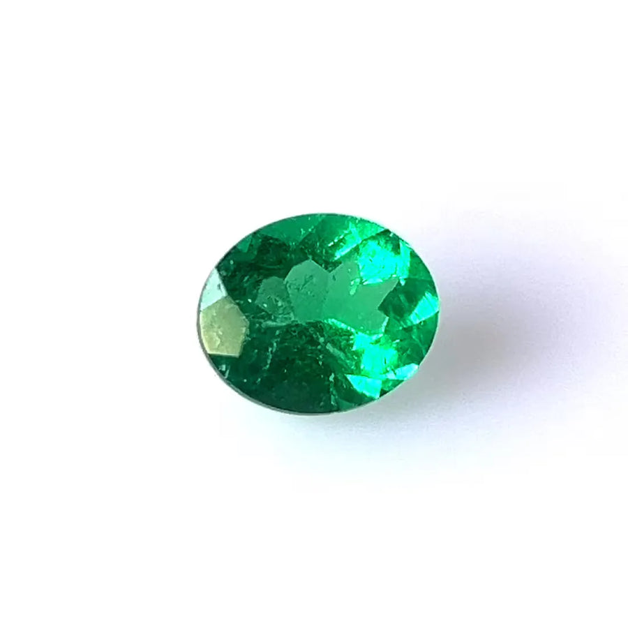 0.87ct Oval Natural Emerald (Colour Green, Clarity Slightly Included, Cut Faceted)