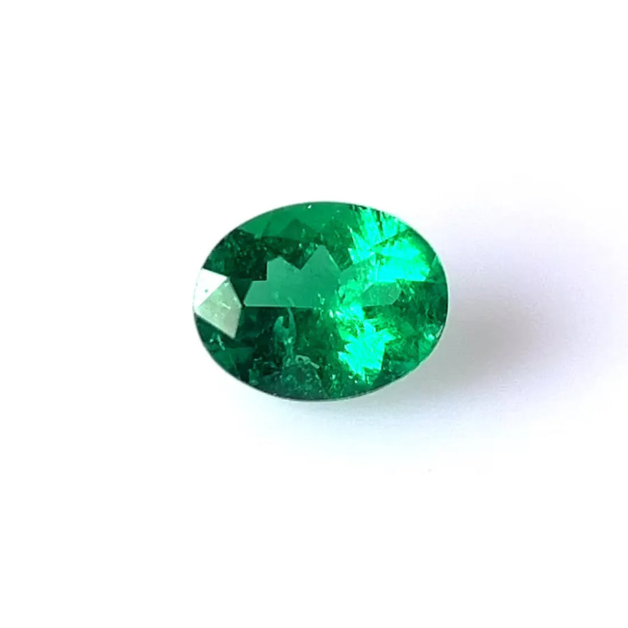 0.94ct Oval Natural Emerald (Colour Green, Clarity Slightly Included, Cut Faceted)
