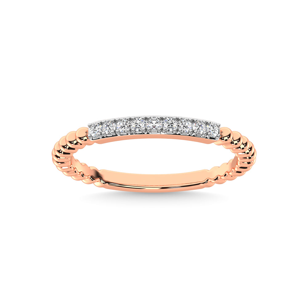 Diamante en oro rosa de 14 quilates de 1/10 quilates total. Banda apilable