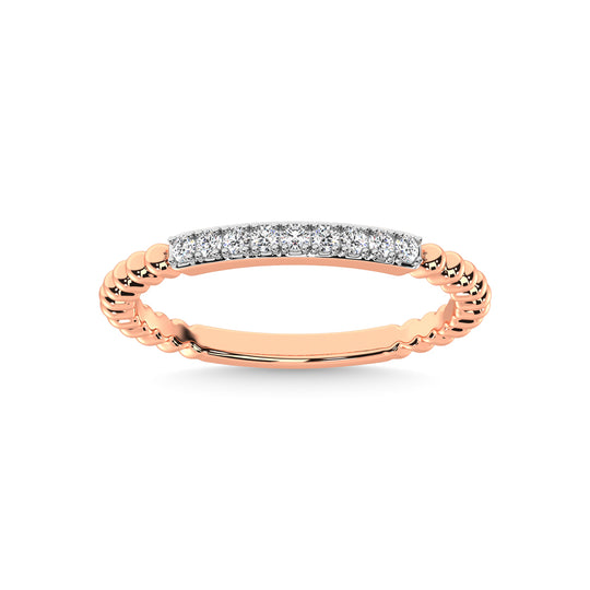 Diamante en oro rosa de 14 quilates de 1/10 quilates total. Banda apilable
