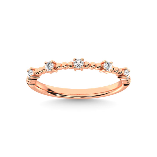 Diamante en oro rosa de 14 quilates de 1/10 quilates total. Banda apilable