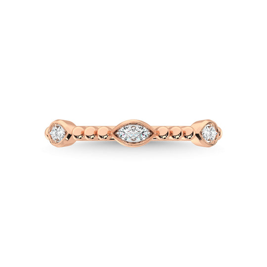Diamante en oro rosa de 14 quilates de 1/10 quilates total. Banda apilable