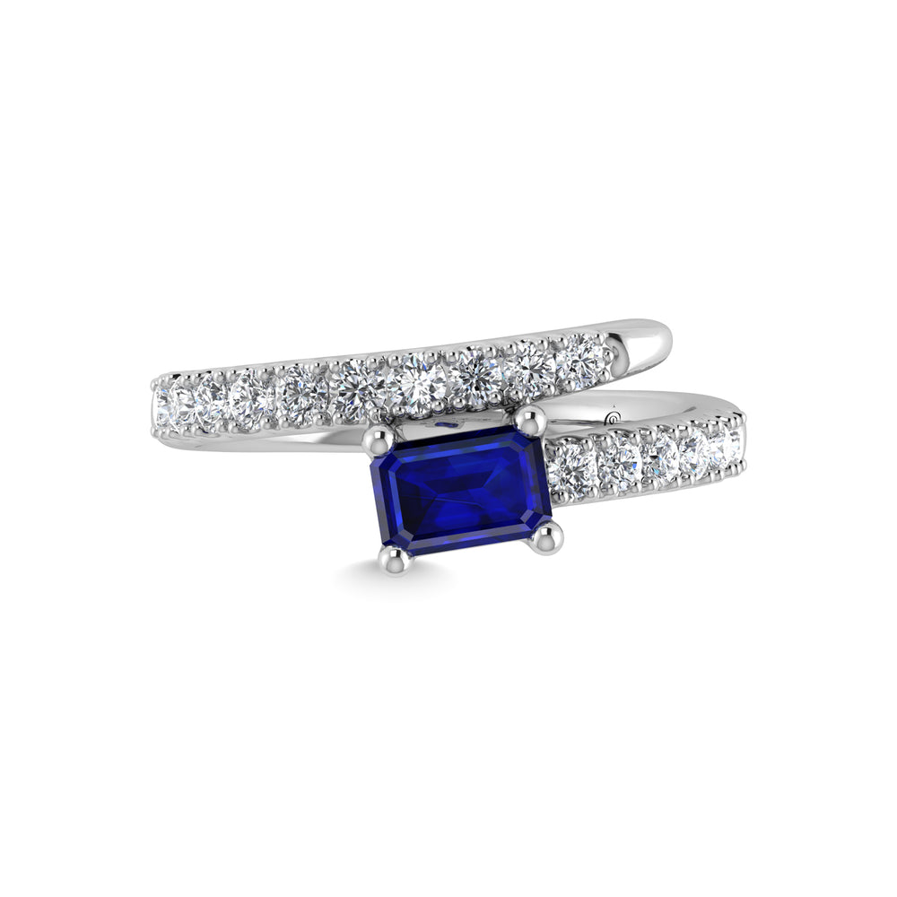 14K white gold, 1 1/6 carat total diamond and blue sapphire. Stackable band.