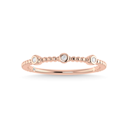 Diamante en oro rosa de 14 quilates de 1/20 quilates total. Banda apilable
