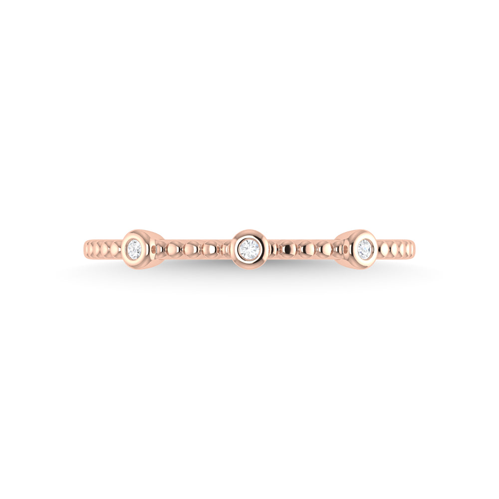 Diamante en oro rosa de 14 quilates de 1/20 quilates total. Banda apilable