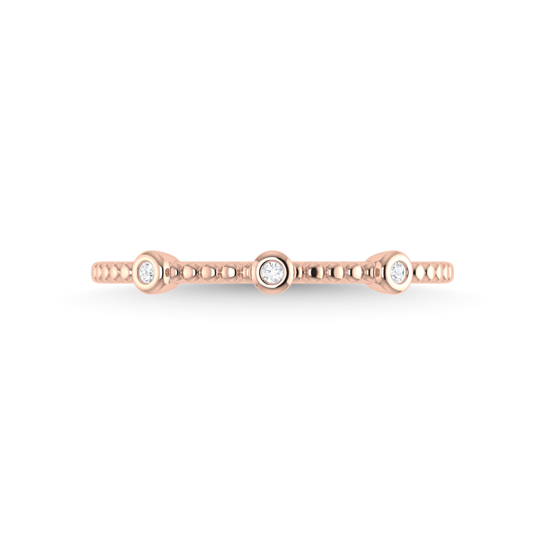 Diamante en oro rosa de 14 quilates de 1/20 quilates total. Banda apilable