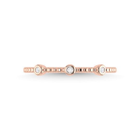Diamante en oro rosa de 14 quilates de 1/20 quilates total. Banda apilable