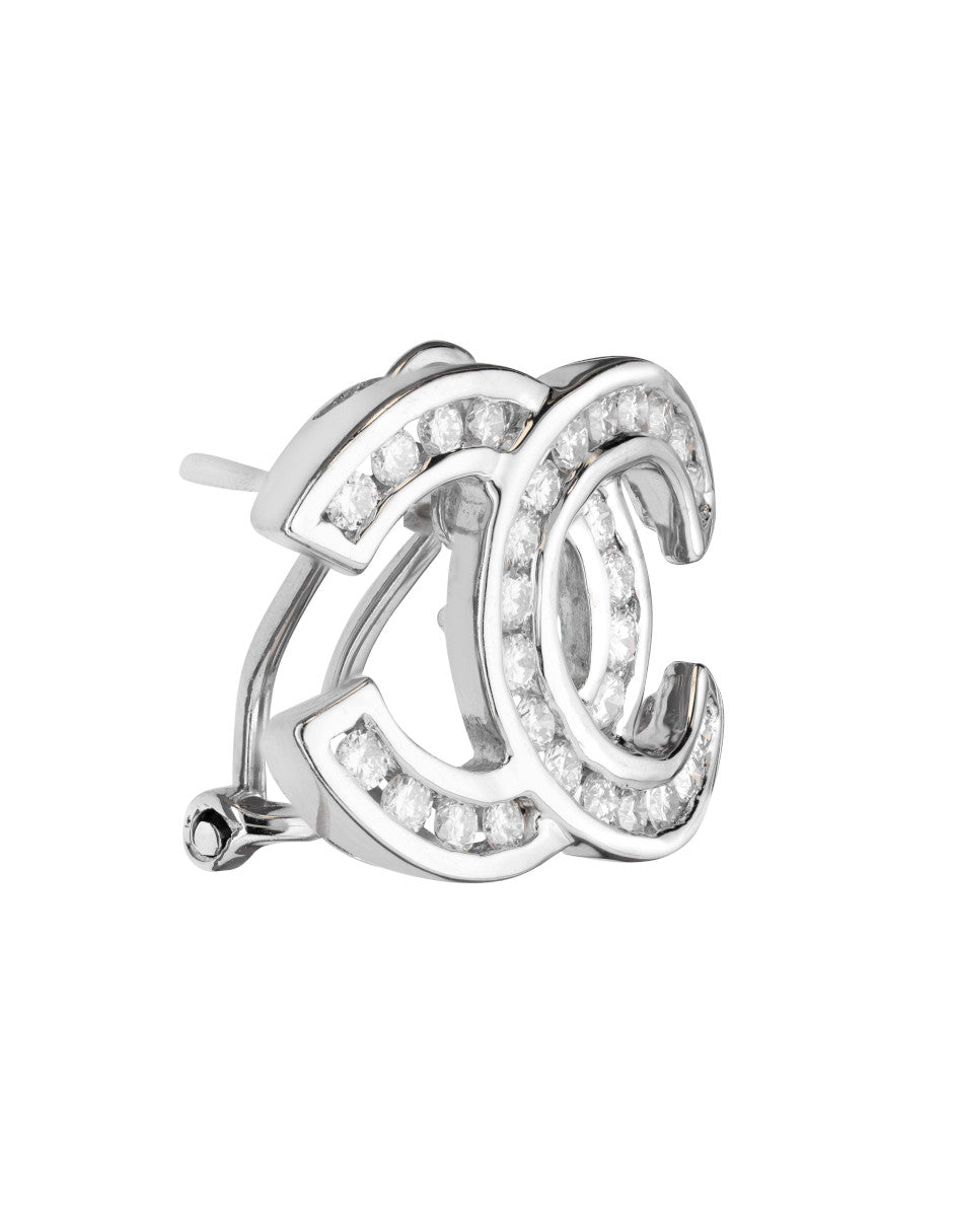 Aretes de oro con Diamante laterales de: 0.60 ct