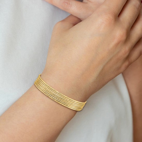 Set of 7 14k Yellow Gold Textured Bangle Bracelets with Dangling Heart