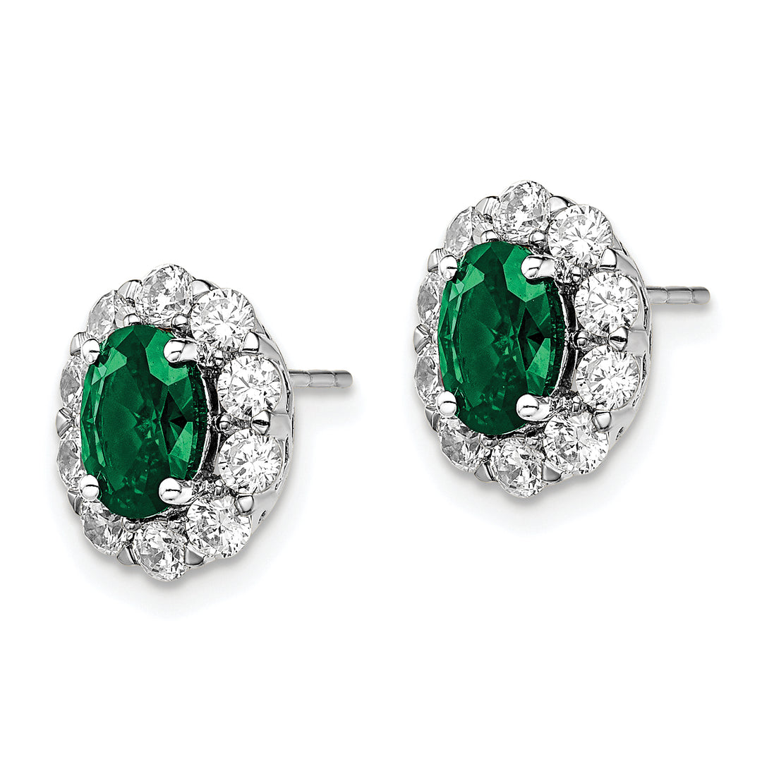 Fashion earrings with oval created emerald and diameter VS/SI FGH lab grown in 14K white gold