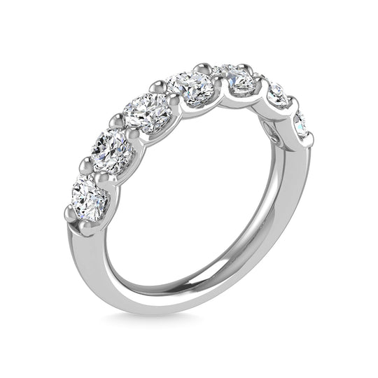 14K white gold diamond, 2.5 carats total. Round-shaped mid-cut band.