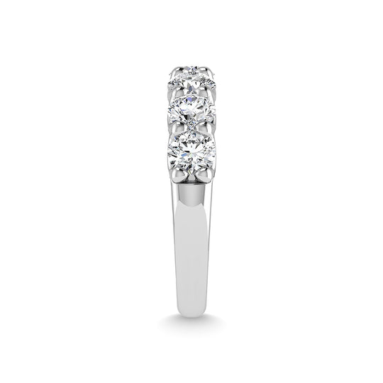 14K white gold diamond, 2.5 carats total. Round-shaped mid-cut band.