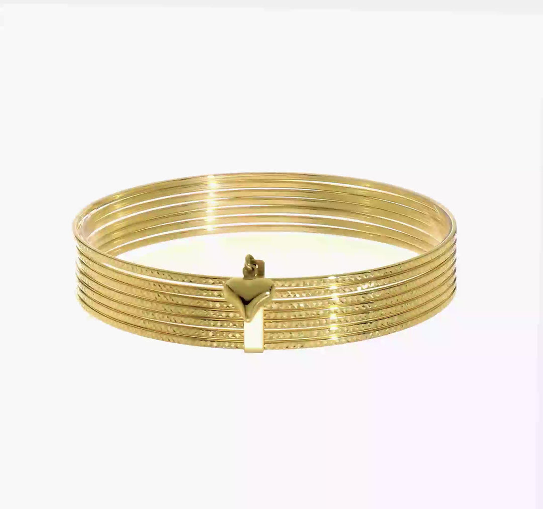 Set of 7 14k Yellow Gold Textured Bangle Bracelets with Dangling Heart