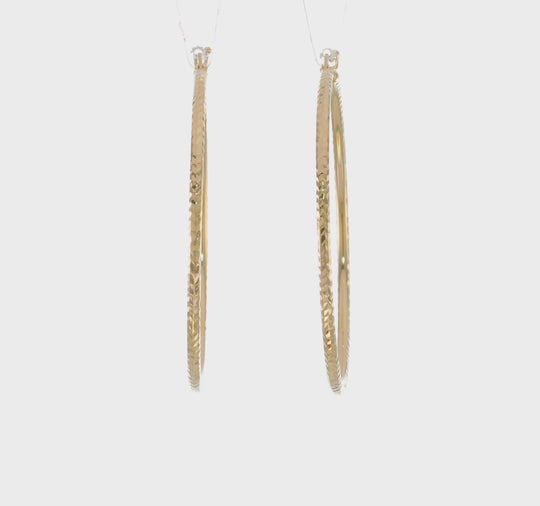 Aretes de Aro Redondo Tubular con Corte de Diamante de 2 mm en Oro de 14K